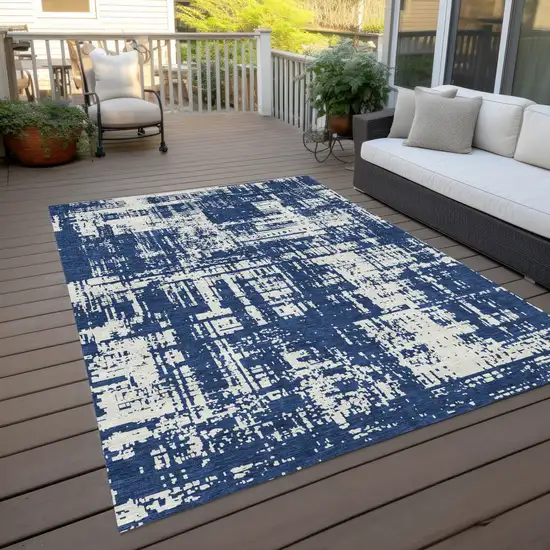 Navy Blue And Ivory Abstract Washable Indoor Outdoor Area Rug Photo 9