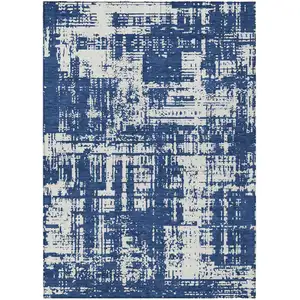 Photo of Navy Blue And Ivory Abstract Washable Indoor Outdoor Area Rug