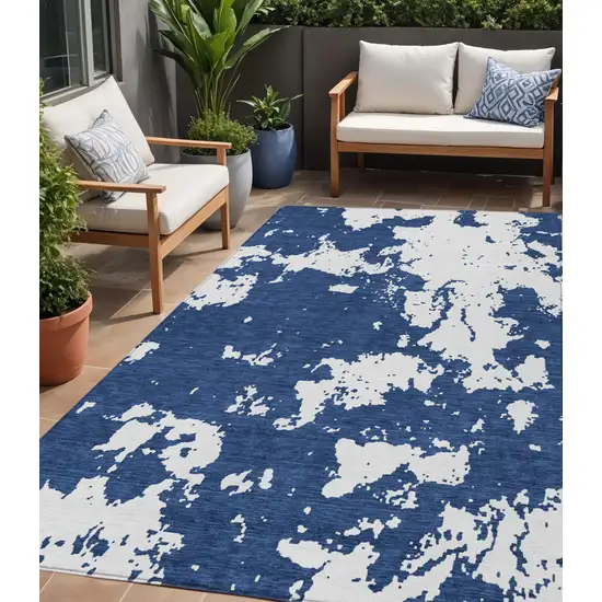 Navy Blue And Ivory Abstract Washable Indoor Outdoor Area Rug Photo 1