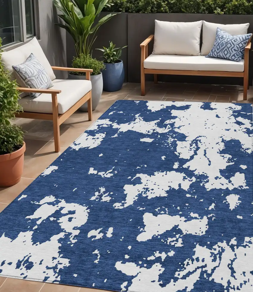 Navy Blue And Ivory Abstract Washable Indoor Outdoor Area Rug Photo 1