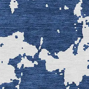 Photo of Navy Blue And Ivory Abstract Washable Indoor Outdoor Area Rug