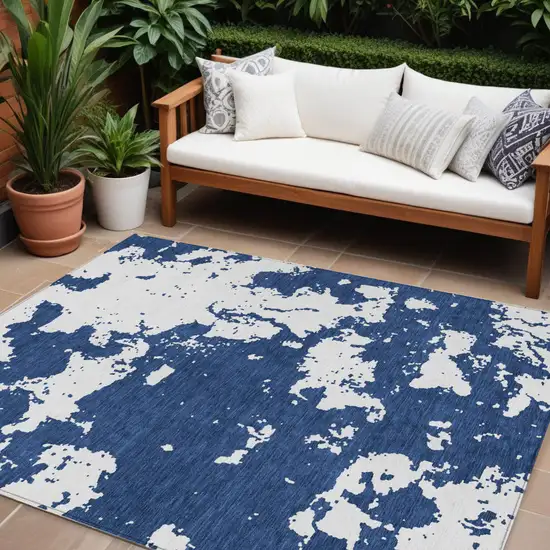 Navy Blue And Ivory Abstract Washable Indoor Outdoor Area Rug Photo 1