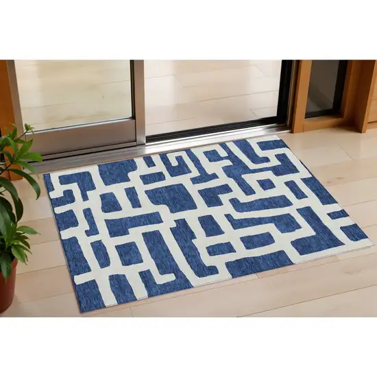 Navy Blue And Ivory Abstract Washable Indoor Outdoor Area Rug Photo 1