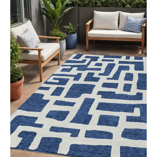 Navy Blue And Ivory Abstract Washable Indoor Outdoor Area Rug Photo 1