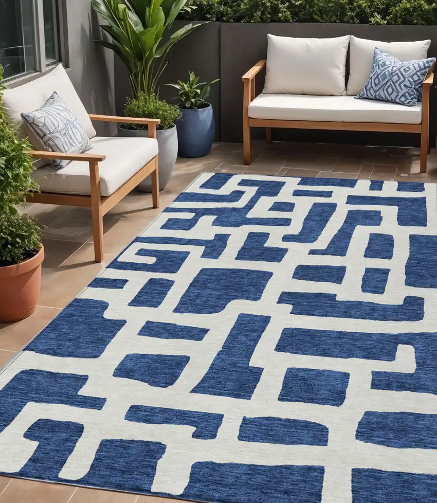 Navy Blue And Ivory Abstract Washable Indoor Outdoor Area Rug Photo 1
