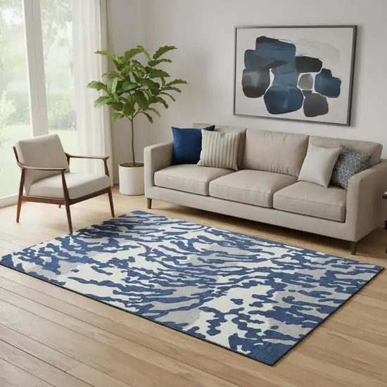 Navy Blue And Ivory Animal Print Washable Area Rug With UV Protection Photo 1