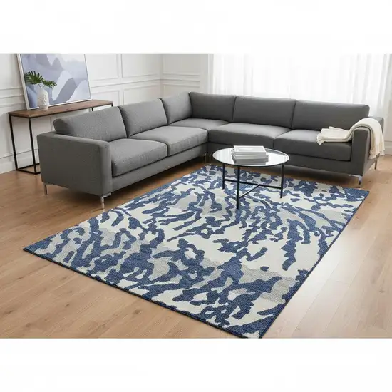 Navy Blue And Ivory Animal Print Washable Area Rug With UV Protection Photo 2