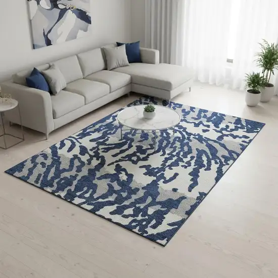 Navy Blue And Ivory Animal Print Washable Area Rug With UV Protection Photo 2