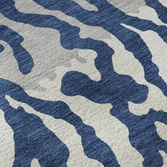 Navy Blue And Ivory Animal Print Washable Area Rug With UV Protection Photo 9