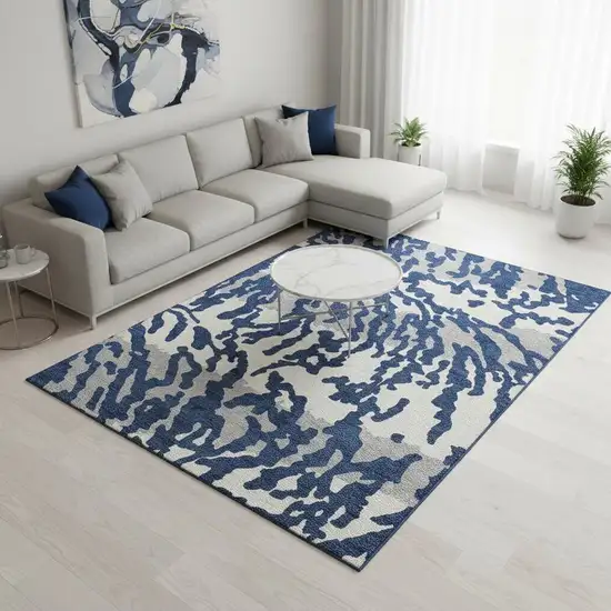 Navy Blue And Ivory Animal Print Washable Area Rug With UV Protection Photo 2