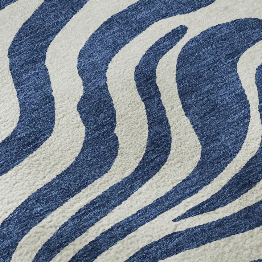 Navy Blue And Ivory Animal Print Washable Area Rug With UV Protection Photo 1