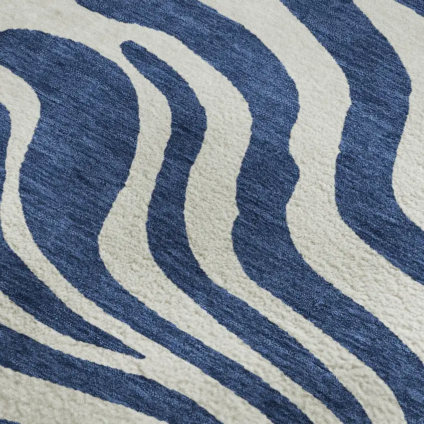 Navy Blue And Ivory Animal Print Washable Area Rug With UV Protection Photo 3