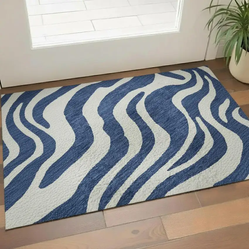 Navy Blue And Ivory Animal Print Washable Area Rug With UV Protection Photo 2
