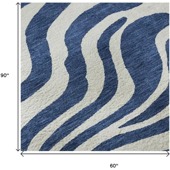 Navy Blue And Ivory Animal Print Washable Area Rug With UV Protection Photo 9