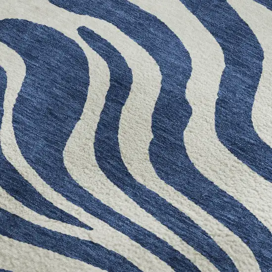 Navy Blue And Ivory Animal Print Washable Area Rug With UV Protection Photo 2