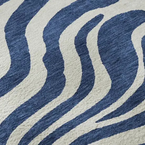 Navy Blue And Ivory Animal Print Washable Area Rug With UV Protection Photo 1