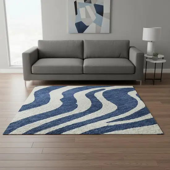 Navy Blue And Ivory Animal Print Washable Area Rug With UV Protection Photo 2