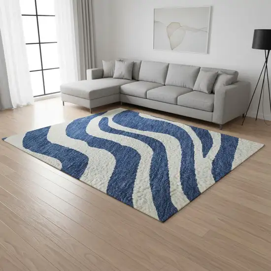 Navy Blue And Ivory Animal Print Washable Area Rug With UV Protection Photo 2