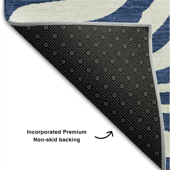 Navy Blue And Ivory Animal Print Washable Area Rug With UV Protection Photo 7