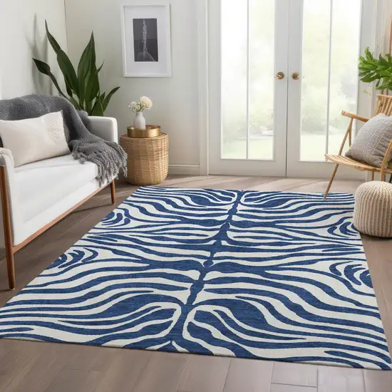 Navy Blue And Ivory Animal Print Washable Area Rug With UV Protection Photo 5