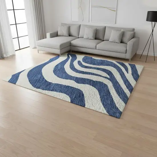 Navy Blue And Ivory Animal Print Washable Area Rug With UV Protection Photo 2