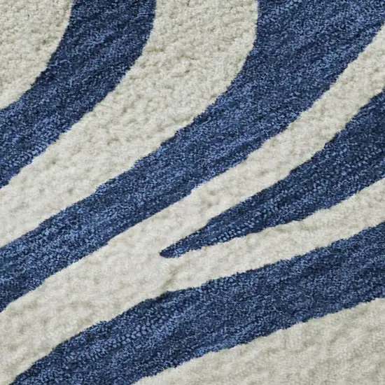 Navy Blue And Ivory Animal Print Washable Area Rug With UV Protection Photo 2