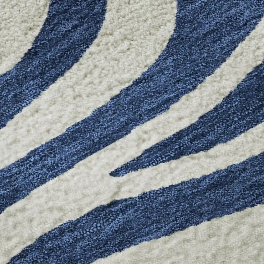 Navy Blue And Ivory Animal Print Washable Area Rug With UV Protection Photo 2