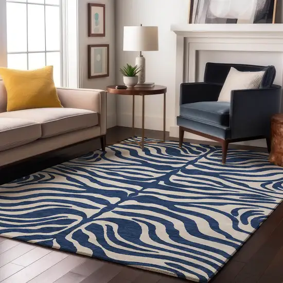Navy Blue And Ivory Animal Print Washable Area Rug With UV Protection Photo 3