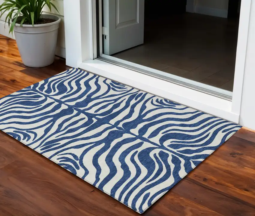 Navy Blue And Ivory Animal Print Washable Indoor Outdoor Area Rug Photo 1