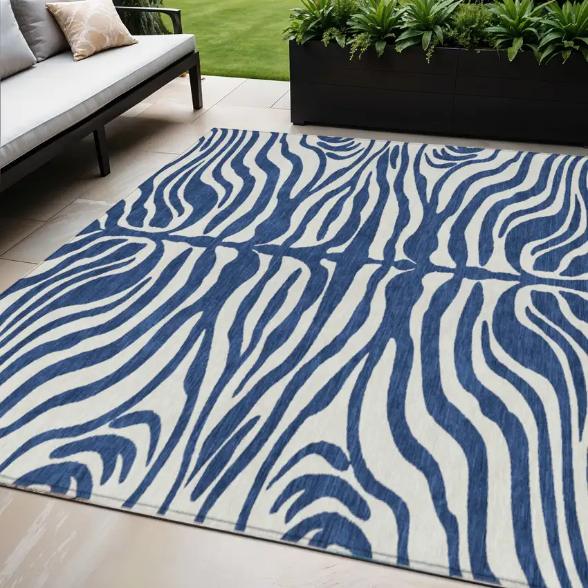 Navy Blue And Ivory Animal Print Washable Indoor Outdoor Area Rug Photo 1