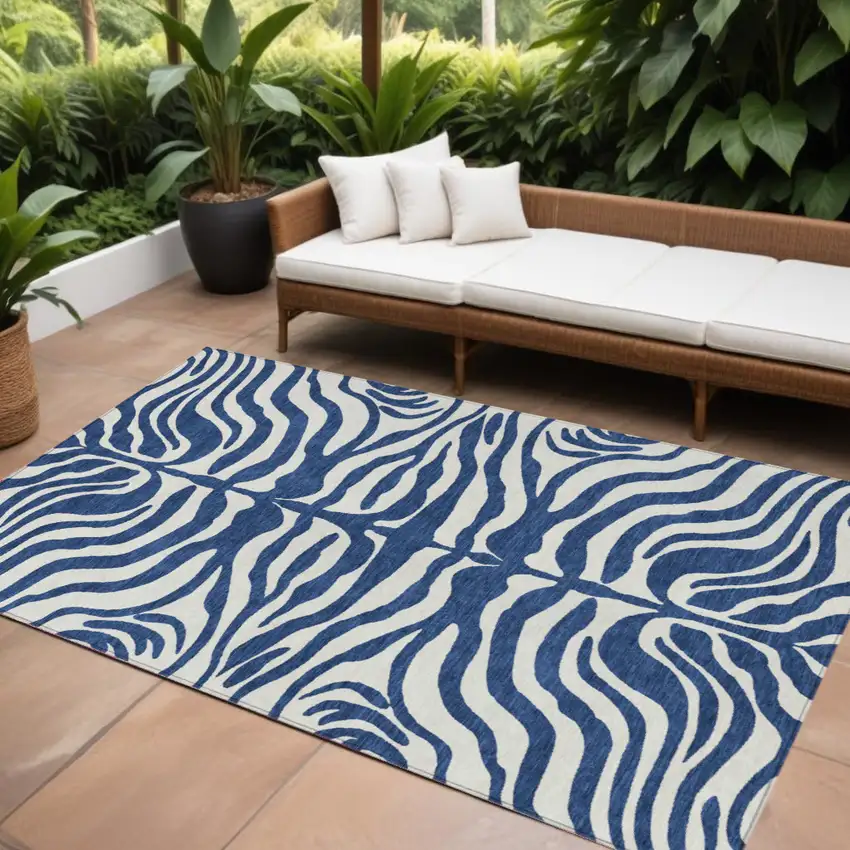 Navy Blue And Ivory Animal Print Washable Indoor Outdoor Area Rug Photo 1