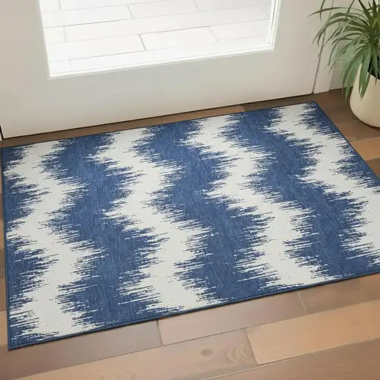 Navy Blue And Ivory Chevron Washable Area Rug With UV Protection Photo 1