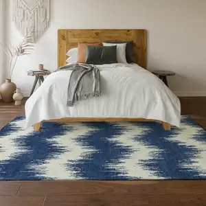 Photo of Navy Blue And Ivory Chevron Washable Area Rug With UV Protection