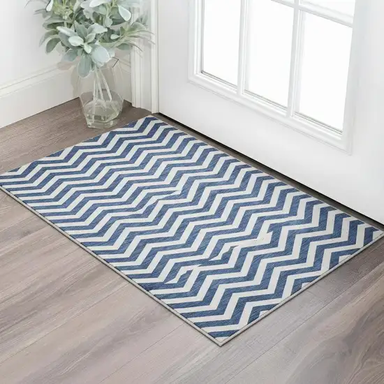 Navy Blue And Ivory Chevron Washable Area Rug With UV Protection Photo 2