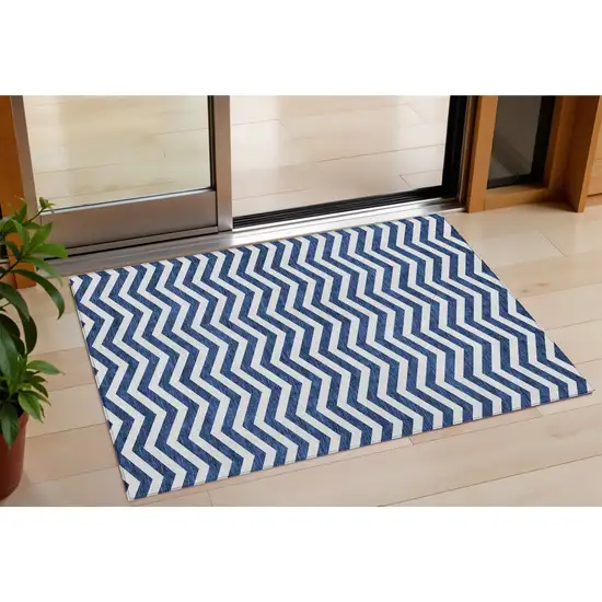 Navy Blue And Ivory Chevron Washable Indoor Outdoor Area Rug Photo 1
