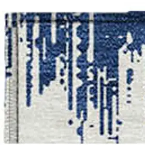 Photo of Navy Blue And Ivory Chevron Washable Indoor Outdoor Area Rug