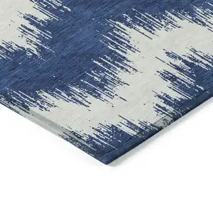 Photo of Navy Blue And Ivory Chevron Washable Indoor Outdoor Area Rug