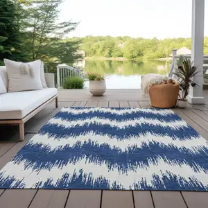 Photo of Navy Blue And Ivory Chevron Washable Indoor Outdoor Area Rug
