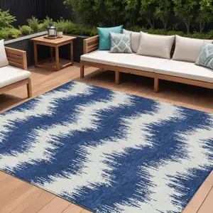 Photo of Navy Blue And Ivory Chevron Washable Indoor Outdoor Area Rug
