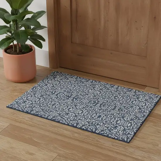 Navy Blue And Ivory Damask Washable Area Rug With UV Protection Photo 1