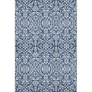 Photo of Navy Blue And Ivory Damask Washable Area Rug With UV Protection
