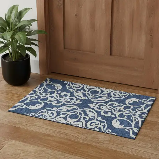Navy Blue And Ivory Damask Washable Area Rug With UV Protection Photo 1