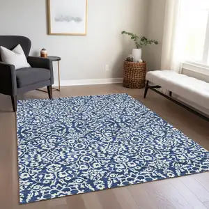 Photo of Navy Blue And Ivory Damask Washable Indoor Outdoor Area Rug