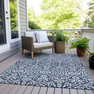 Photo of Navy Blue And Ivory Damask Washable Indoor Outdoor Area Rug