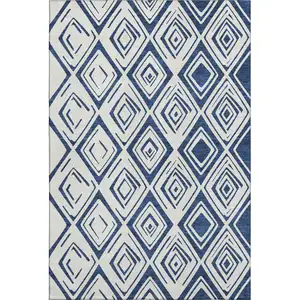 Photo of Navy Blue And Ivory Diamond Washable Area Rug With UV Protection