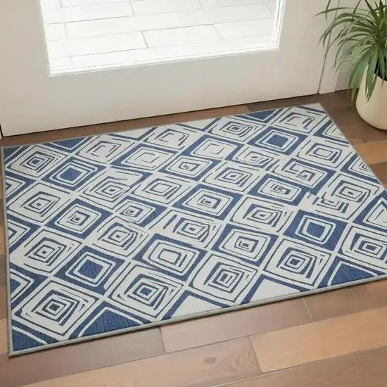 Navy Blue And Ivory Diamond Washable Area Rug With UV Protection Photo 2