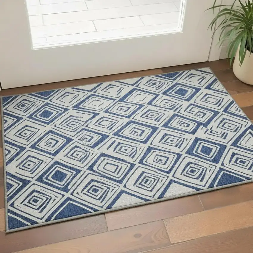 Navy Blue And Ivory Diamond Washable Area Rug With UV Protection Photo 2