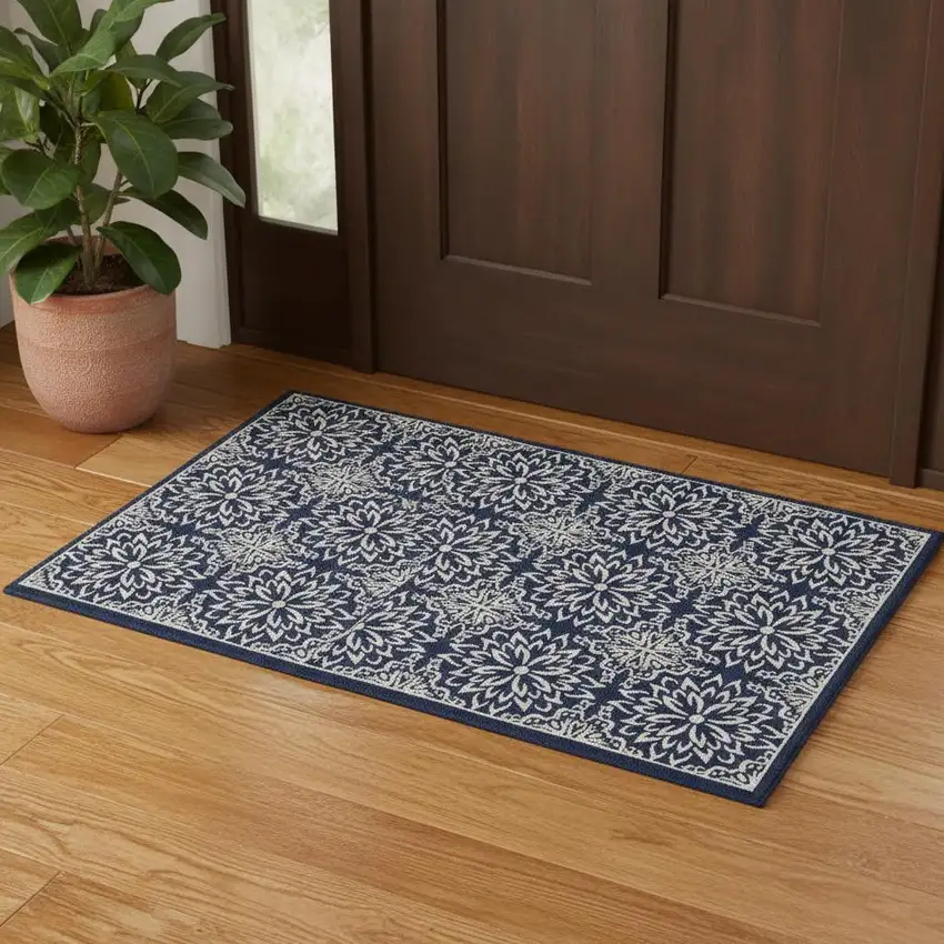 Navy Blue And Ivory Floral Area Rug Photo 1