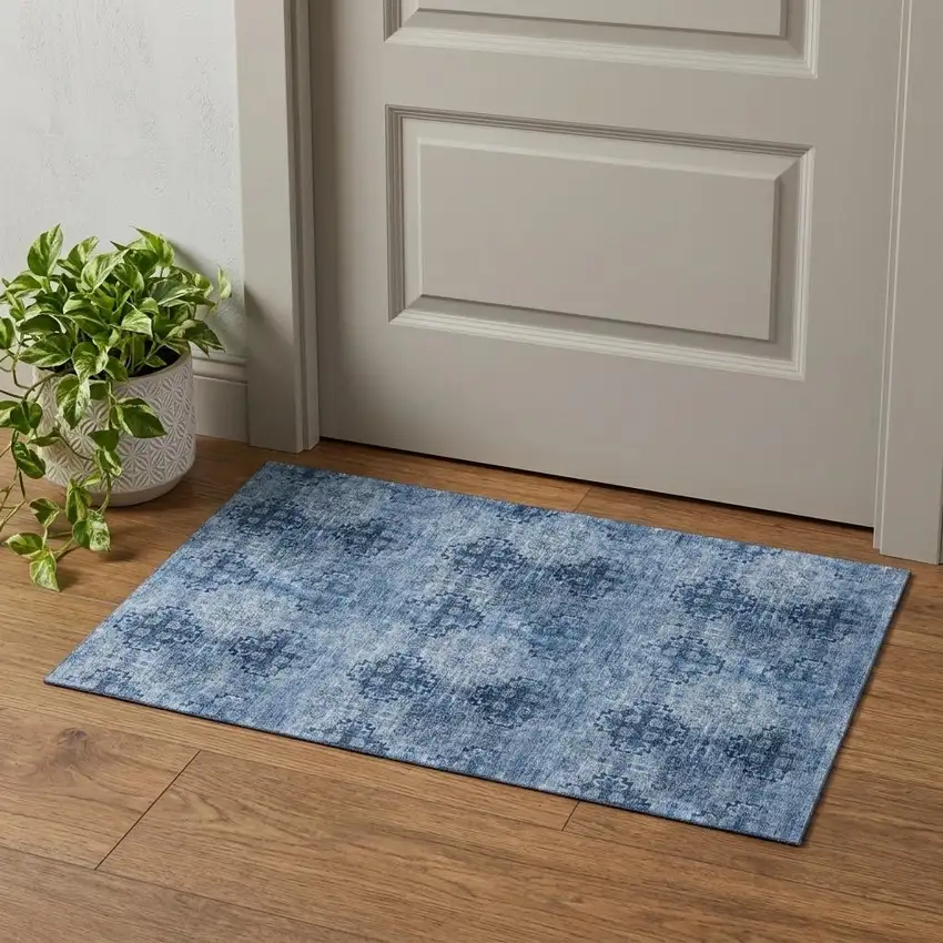 Navy Blue And Ivory Floral Medallion Distressed Washable Area Rug With UV Protection Photo 1