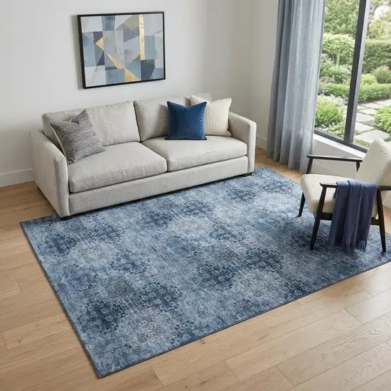 Navy Blue And Ivory Floral Medallion Distressed Washable Area Rug With UV Protection Photo 1